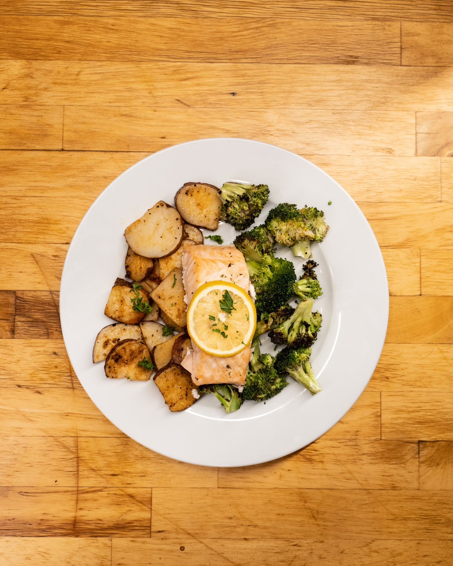 5 oz Baked Lemon Garlic Salmon, Roasted Red Potatoes and Veggies.